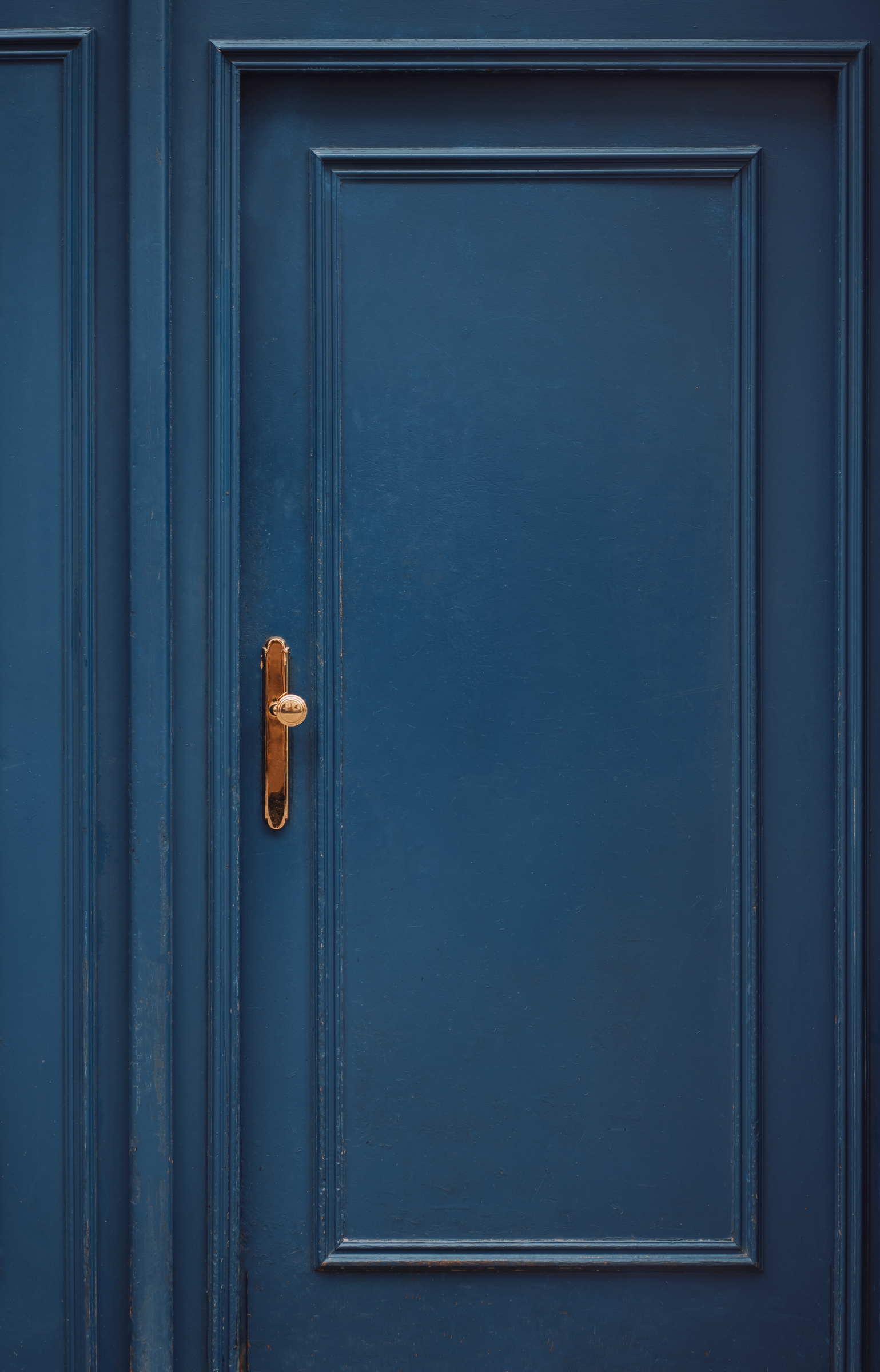 Blue door background, copy space, travel aesthetic